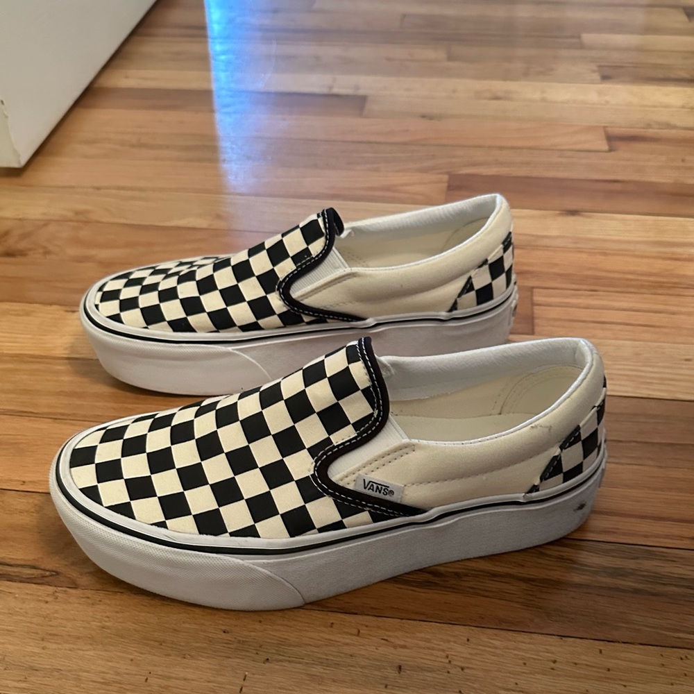 Black and white checkerboard slip on stackform Vans